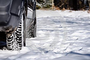 offroad car tires stuck in the snow