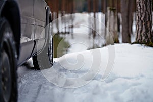 offroad car tires stuck in the snow