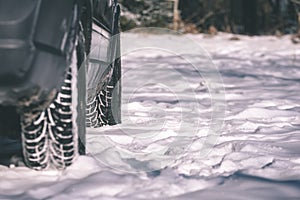offroad car tires stuck in the snow - vintage look edit