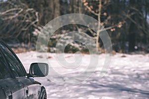 offroad car tires stuck in the snow - vintage look edit