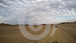 Offroad Driving ATV through desert