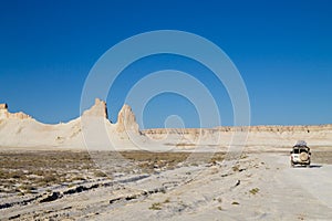 Offroad vehicle in Bozzhira valley, adventure travel, Kazakhstan