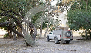 Offroad 4x4 vehicle with tent in the roof