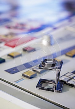 Offset printing work place with magnifying glass