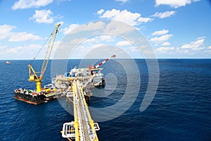 Offshore construction platform for production oil and gas. Oil and gas industry and hard work.