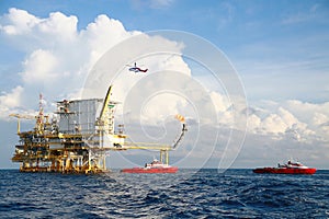 Offshore construction platform for production oil and gas. Oil and gas industry and hard work. Production platform and operation