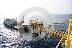 Offshore construction platform for production oil and gas. Oil and gas industry and hard work. Production platform and operation