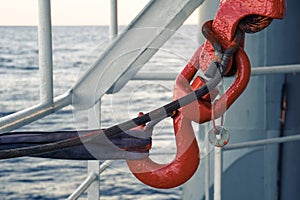 Offshore crane hook is secured for sea passage.