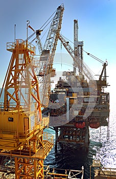 Offshore exploration, crane at work during construction