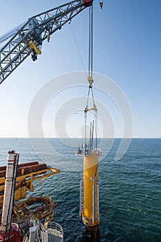 Offshore installation of a wind tubine foundation