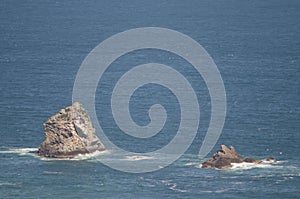 Offshore islets in Sandfly Bay.