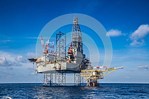 Offshore oil and gas drilling rig while completion well on oil a