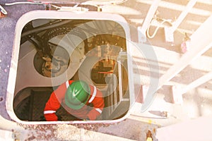 Offshore oil and gas industry and operated by technician petroleum. Worker walking to oil and gas plant for work as routine plan.