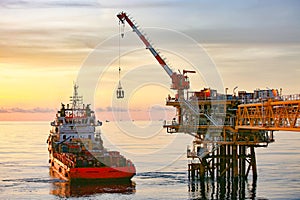 Offshore oil and gas industry and operated by technician petroleum. Worker walking to oil and gas plant for work as routine plan.