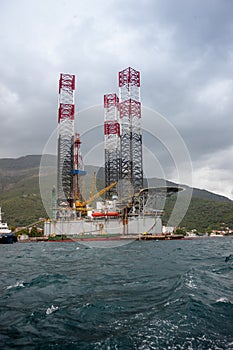 Offshore Oil and Gas Platform Moored in the Port for Repair .Offshore Drilling Rig with Facilities, Helipad, Oil Rig