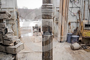 Offshore oil rig worker prepare tool and equipment for perforation oil and gas well at wellhead platform