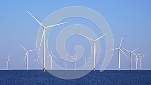 Offshore wind farm with many windmills, IJsselmeer, the Netherlands