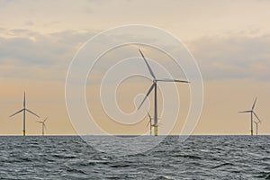 Offshore wind farm during sunset