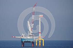 Offshore wind turbine installation with crane