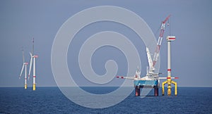 Offshore wind turbine installation with crane