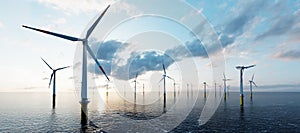 Offshore wind turbines farm on the ocean. Sustainable energy photo