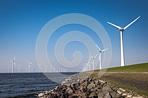 Offshore Windmill farm in the ocean Westermeerwind park , windmills isolated at sea on a beautiful bright day