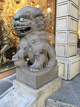 Chinatown`s Dragon Gate, guardian male lion, 4.