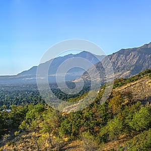 Ogden Utah landscape with mountains and blue sky photo