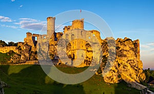 Ogrodzieniec Castle in Poland In the rays of the rising sun The castle is part of the system of strongholds known as the Eagles`