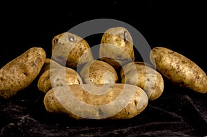 Oh hi we have a stack of potato`s with eye`s