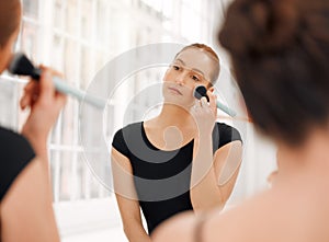 Oh, reckless abandon. a group of ballet dancers preparing to go on stage and applying makeup together in a mirror.