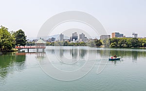 Ohori Park with Ukimi Pavilion and Skyline in the background. Chuo-ku, Fukuoka, Japan, Asia photo