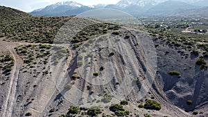 OHV area with steep rutted paths going up out of the pit photo