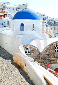 Oia church with blue cupola on Santorini island, Cyclades, Greec