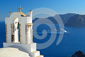 Oia church tower and cruise ship, Santorini, Cyclades, Greece