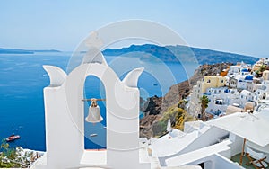 Oia Santorini Greece on a sunny day during summer with whitewashed homes and churches, Greek Island