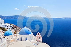 Oia town on Santorini island, Greece. Caldera on Aegean sea.