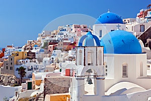 Oia town on Santorini island, Greece. Caldera on Aegean sea.