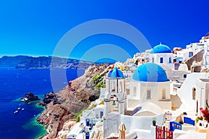 Oia town on Santorini island, Greece. Caldera on Aegean sea.