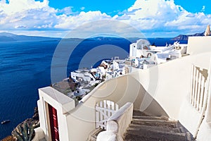 Oia village with famous white houses on Santorini island, Aegean sea, Greece