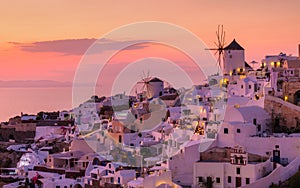 Oia village, Santorini, Greece. View of traditional houses in Santorini. Small narrow streets and rooftops of houses, churches and