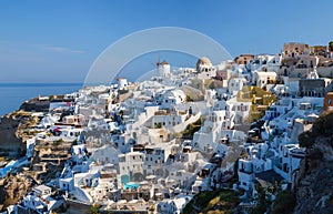 Oia village, Santorini Island, Greece. View of traditional houses and church in Santorini