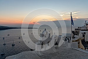 Oia village at the sunset - Aegean sea - Santorini island - Greece