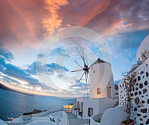 Oia village with windmill on Santorini island in Greece