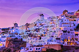 Oia village, windmills, Santorini island, Greece at colorful sunset