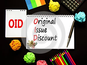 OID original issue discount symbol. Concept words OID original issue discount on beautiful white note. Beautiful black background