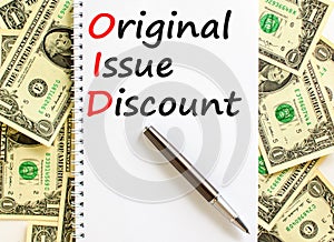 OID original issue discount symbol. Concept words OID original issue discount on beautiful white note. Beautiful dollar bills