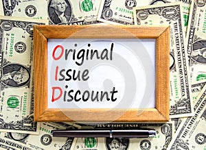 OID original issue discount symbol. Concept words OID original issue discount on beautiful wooden frame. Beautiful dollar bills