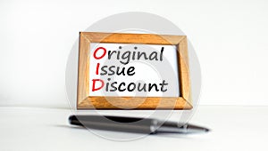 OID original issue discount symbol. Concept words OID original issue discount on beautiful wooden frame. Beautiful white