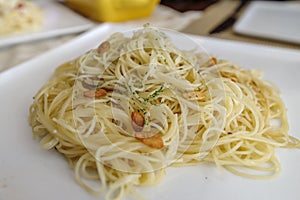 Oil base pasta Spaghetti Aglio on the table